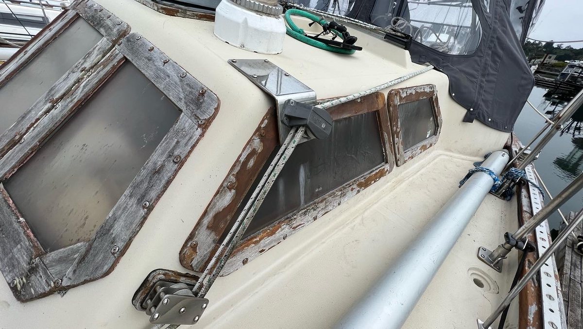 Weathered portlights before refit